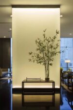 Our innovative lighting solutions utilize acrylic resin panels and liquid metal finishes to enhance the aesthetic appeal of any space. These custom lighting designs create a warm and inviting atmosphere.